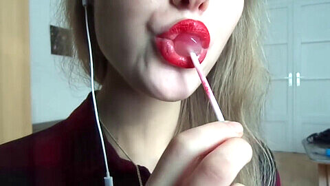 ASMR suçant une sucette au rouge à lèvres cramoisi - des sons sensuels pour satisfaire vos fantasmes.
