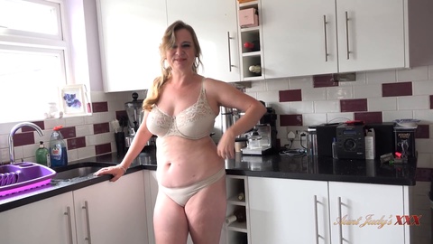 Perverted stepmother asks for a fuck in the kitchen