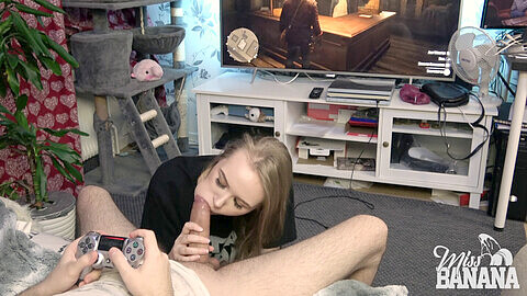 Naughty couple: he tries to game while she indulges in cock worship!