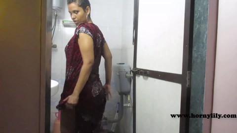 Desi college babe with a massive ass enjoys herself in the bathroom