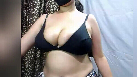 Indian MILF shows off her massive boobs and lingerie