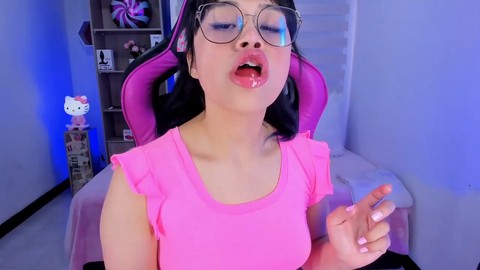 Lila Jordan indulging in gummy play with her tantalizing tongue