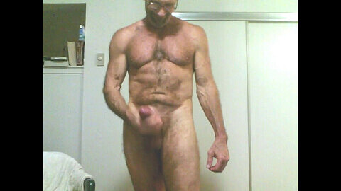 jXmuscle proudly shows off his massive manhood, stroking his gigantic salami