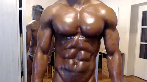 Muscular ebony hunk flexes on webcam (Watch him reveal more in private)
