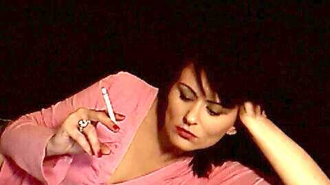 LadyLuck fulfills your request and smokes a VS 120 cigarette while dressed in pink