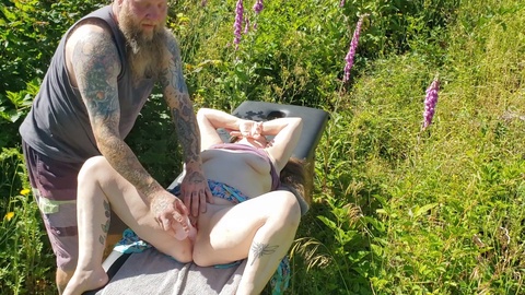 Outdoor sex with a curvy married woman - tattoos, furry pussy and all!