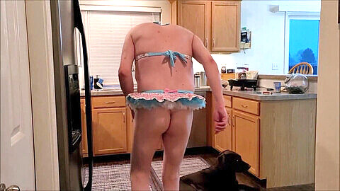 Skinny sissy Jeffery Heuett prepares dinner in feminine outfit