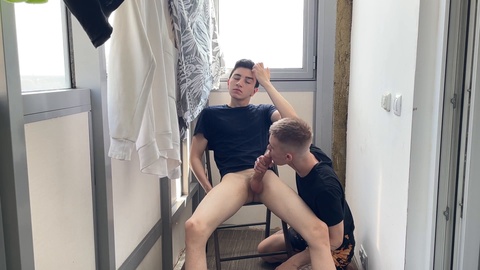 Steamy balcony blowjob between two inexperienced twinks