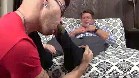 Jock Bryce gets his bare feet worshiped while stroking his ripped cock