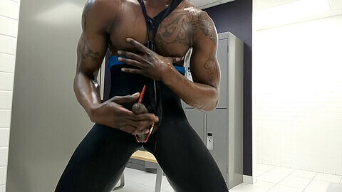 Getting naughty in a public shower - hot gay black action!
