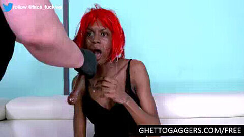 Aggressive reality scene featuring a black babe getting face fucked by a thick big dick