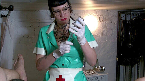 Kinky nurse gives rough scrotal insertion treatment