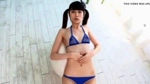 Adorable Japanese babe in a bikini