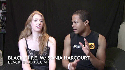 Sonia Harcourt, the red-headed porn amateur, gets interviewed by a big black dick
