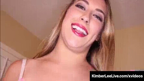 Blonde babe Kimber Lee gives a POV blowjob with red lips and natural tits!