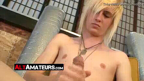 Skinny blonde Alaric pleasures himself by stroking and rubbing his throbbing dick
