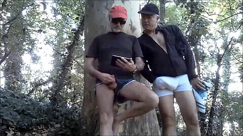 Two sexy studs Olyvier and a cub meet in the forest for an amateur gay blowjob session