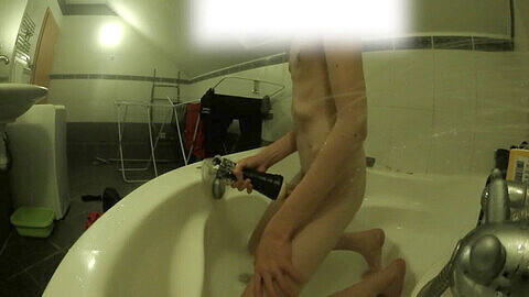 Soaking wet bath time fun with artificial pussy and foot goddess Munia!