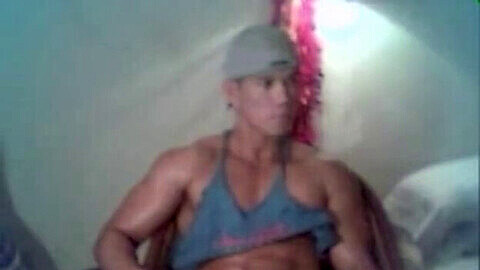 Well-endowed Asian hunk with bulging muscles showcases his massive package