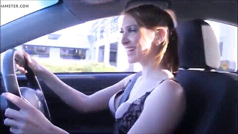 chick driving car in high high-heeled slippers and stockings