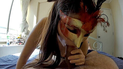 Masked beauty gives a sizzling blowjob!