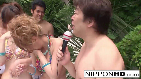 Grappling match between numerous attractive Japanese bikini babes