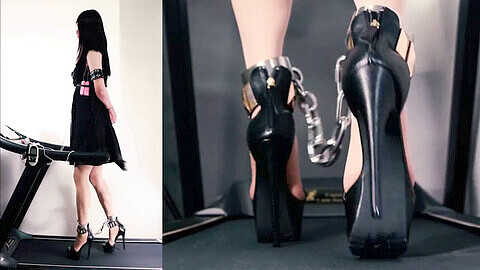 Japanese slave walks on treadmill in heels while chained and wearing adult toys
